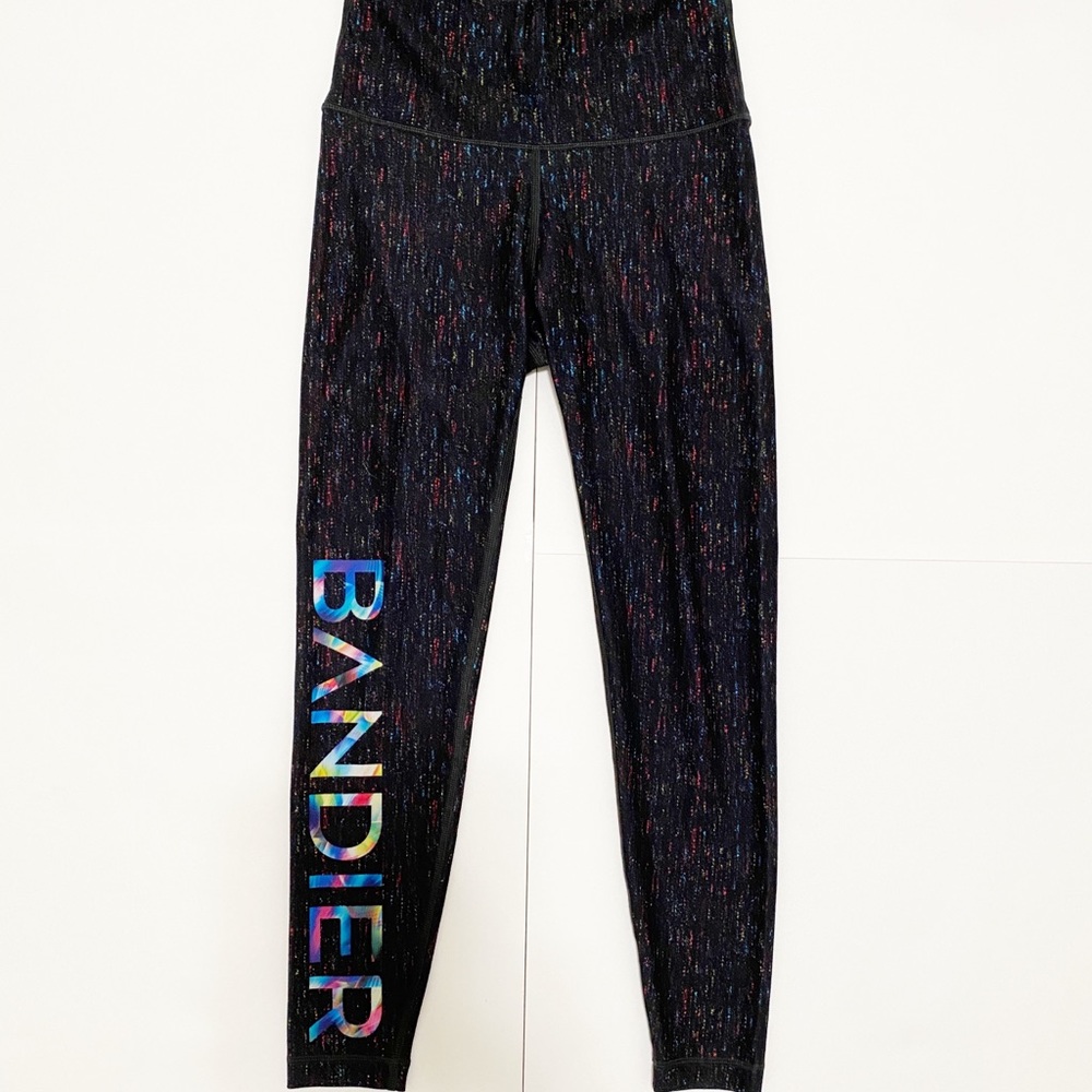 Bandier WITH black speckled leggings